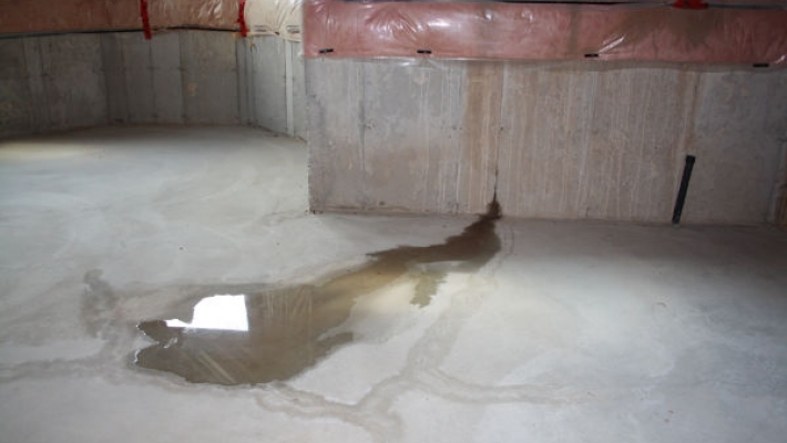 concrete basement leaking water
