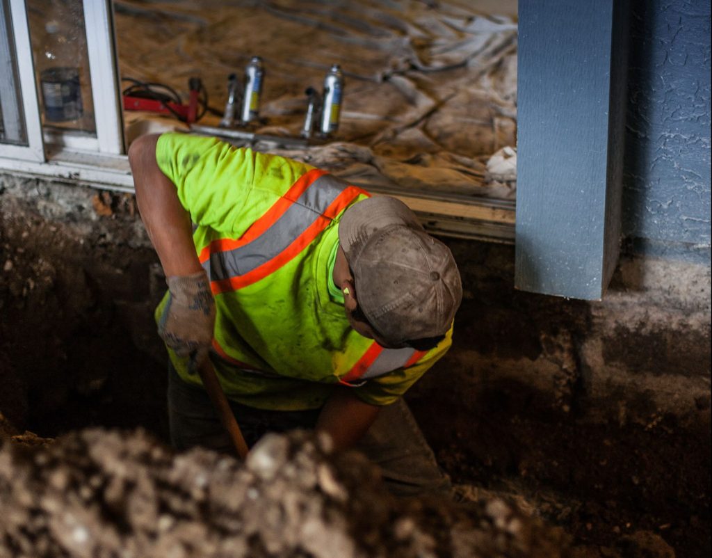 crew digging a hole