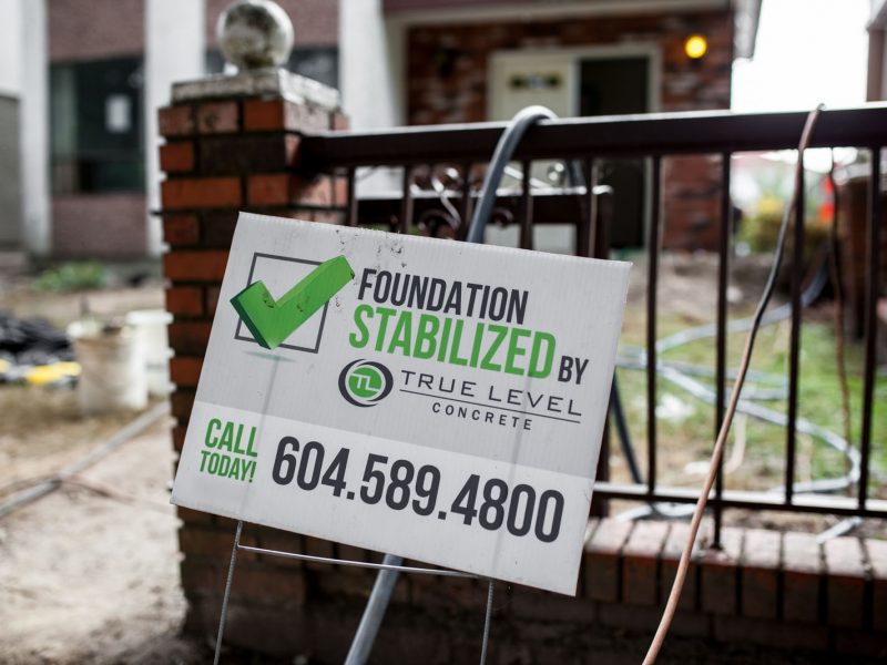 "Foundation stabilized by True Level" sign
