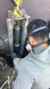 Staff wearing a mask during foundation lift