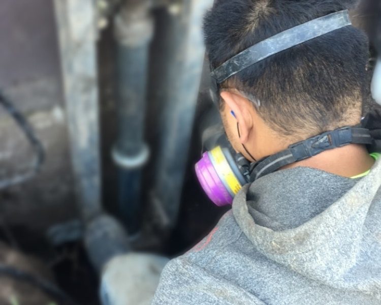 Staff wearing a mask during foundation lift