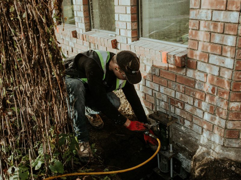 Staff fixing foundation candid