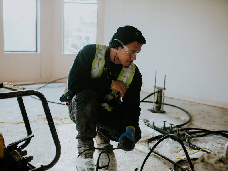 Staff during foundation repair indoor