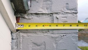Measuring tape against the wall