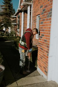 Staff drilling the concrete