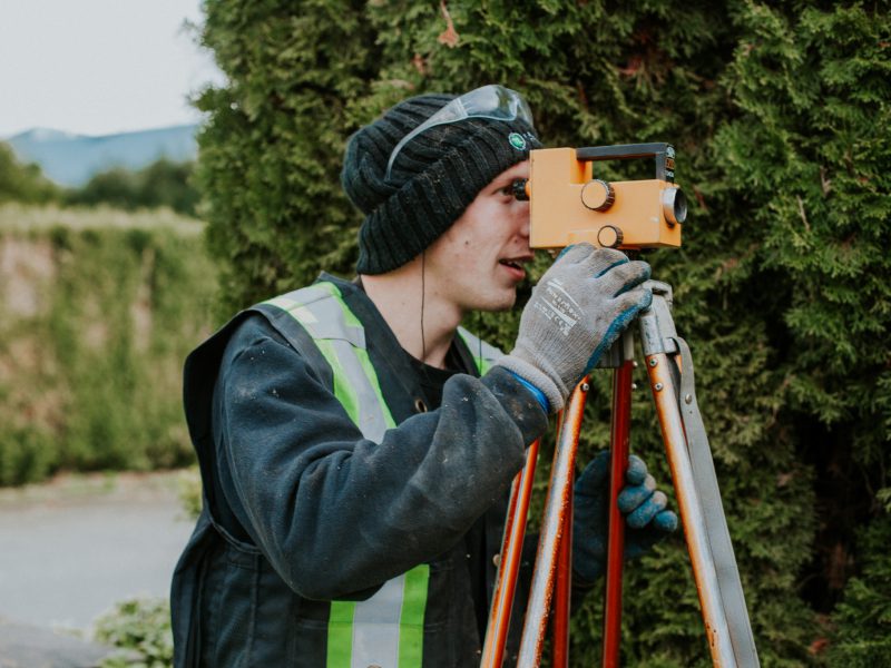 True level staff looking through a lens