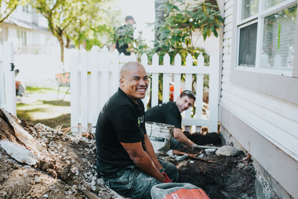 True Level crew excavating a hole