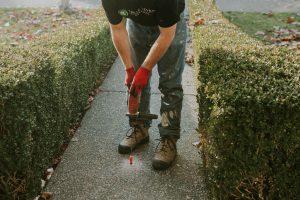 True Level employee with a slabjacking and crack repair tool