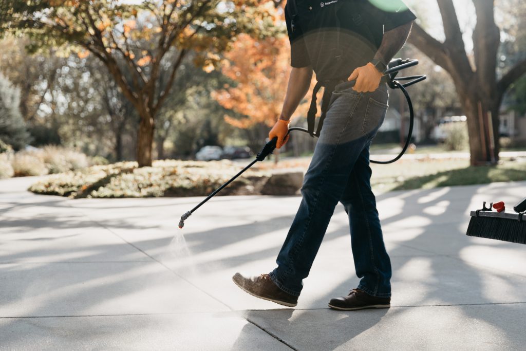 Employee with a concrete tool