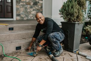 True level staff fixing a crack and void fill