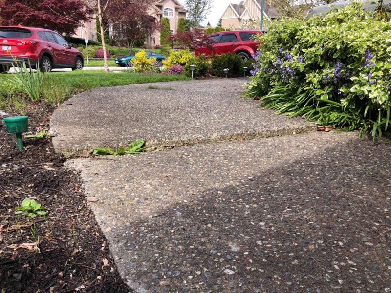 Close up view of concrete that may cause people to trip