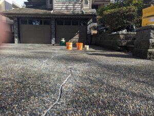 driveway with closeup of cracks