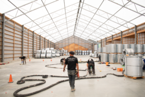 our team in a metal warehouse