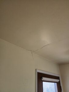 Crack in drywall - symptoms of settlement in Richmond home