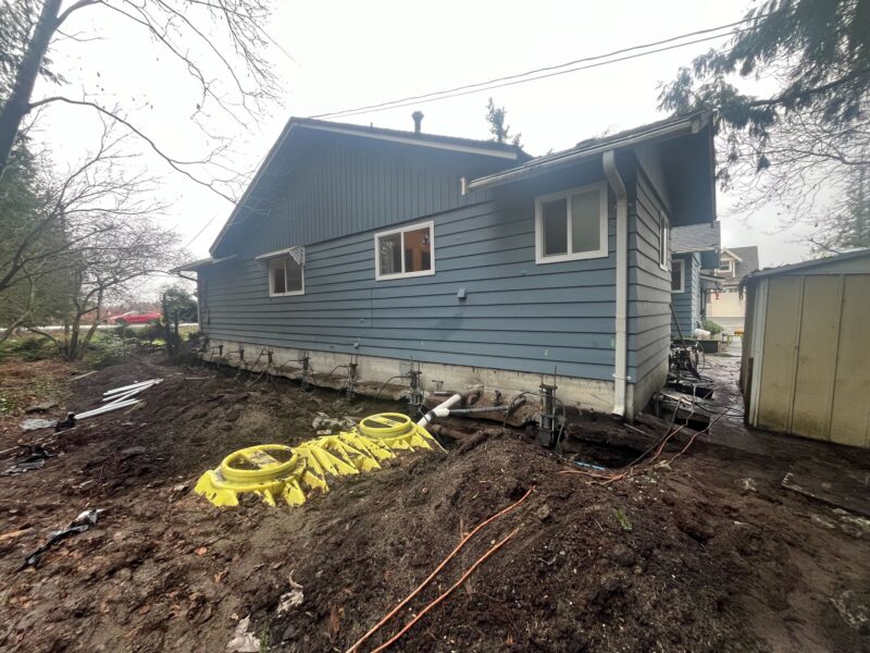 House in Richmond with piers exposed foundation project Metro Vancouver Foundation Repair