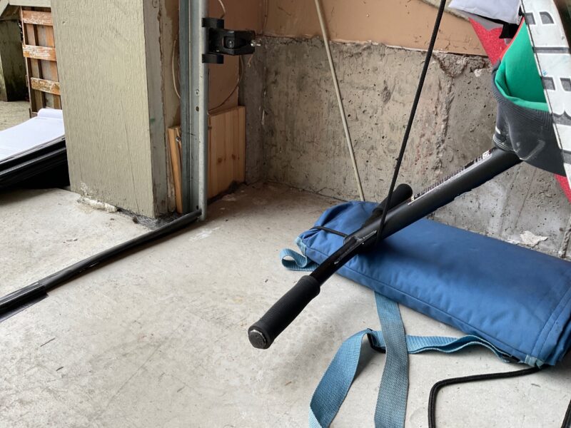 Before: Interior of garage has water damage from winter leaks