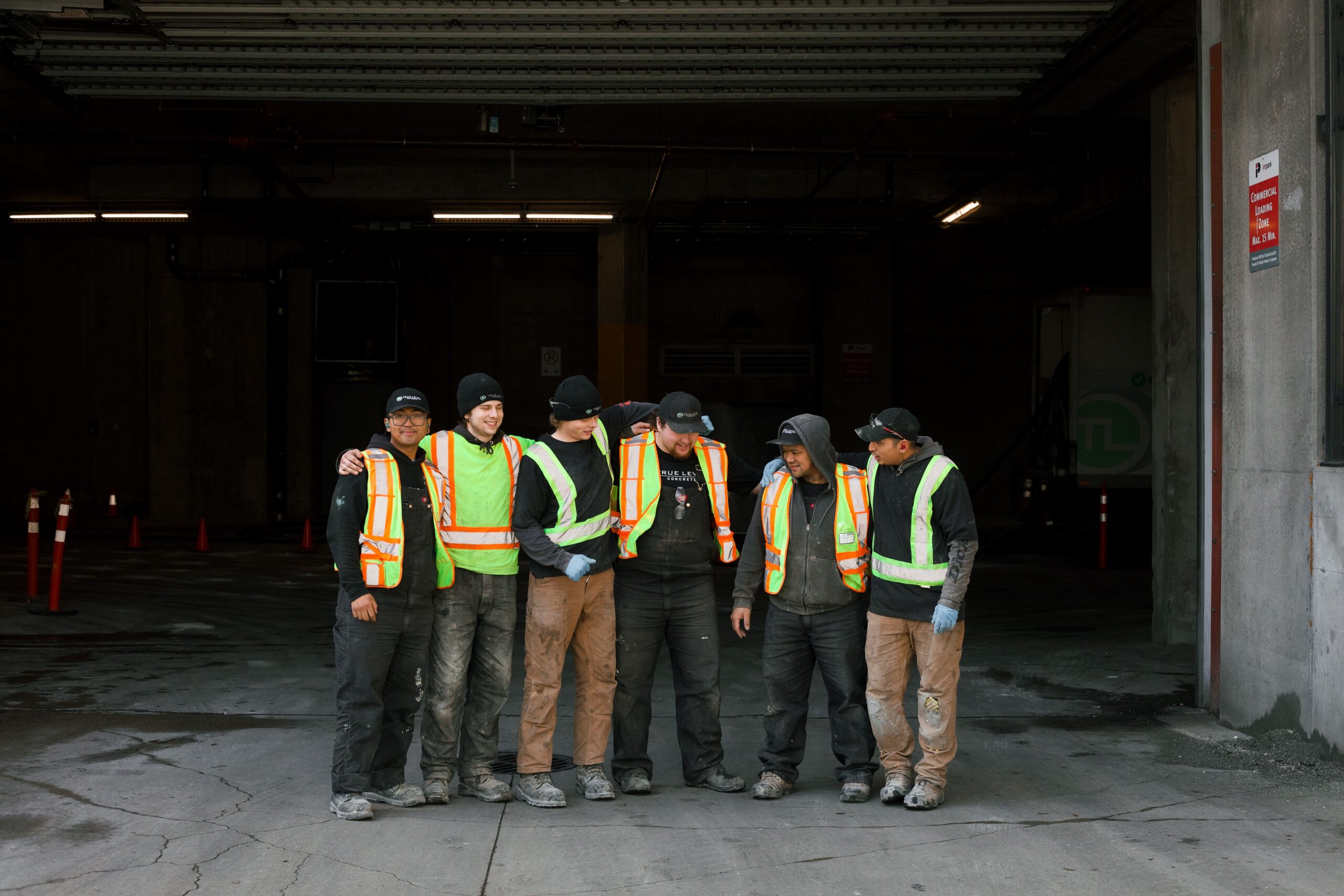 Team photo of the crew in a loading dock