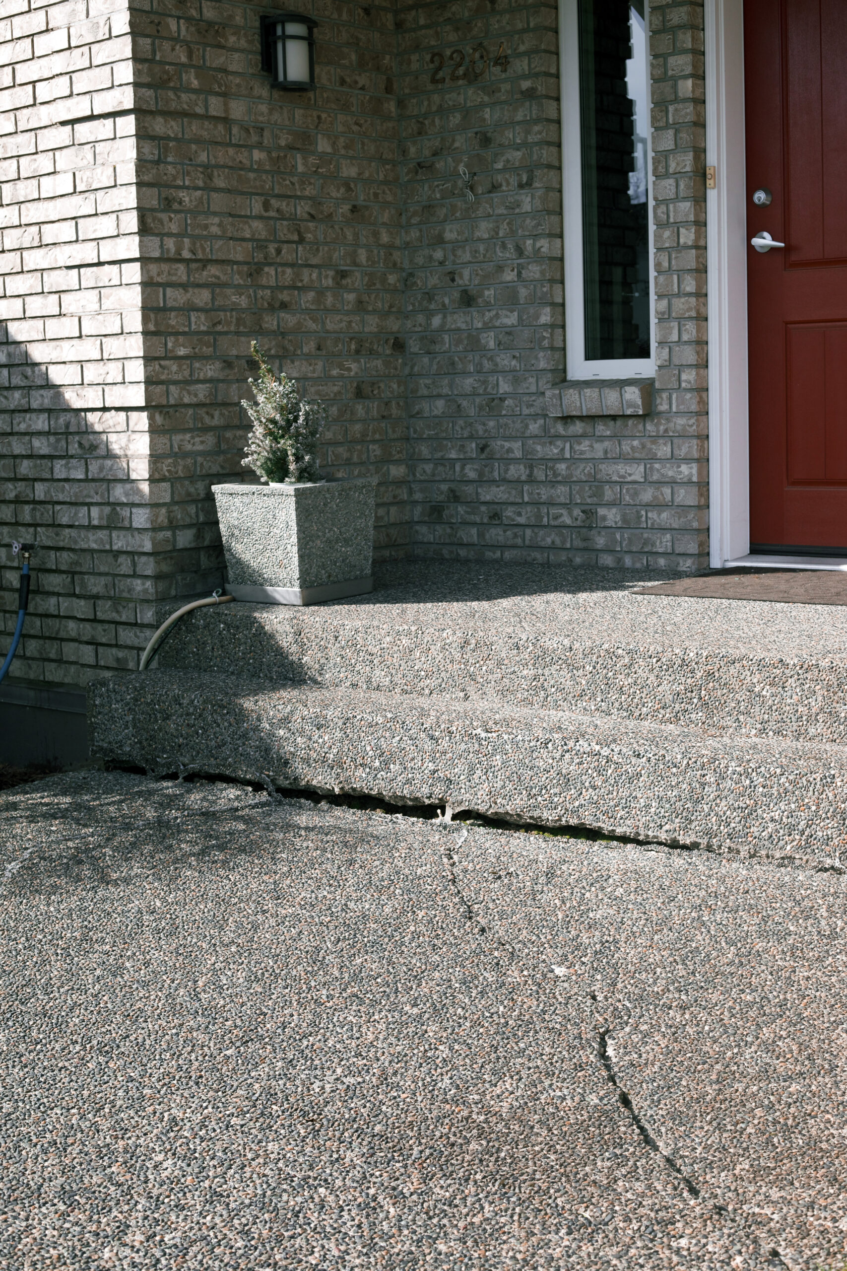 Before image of a gap in concrete stairs