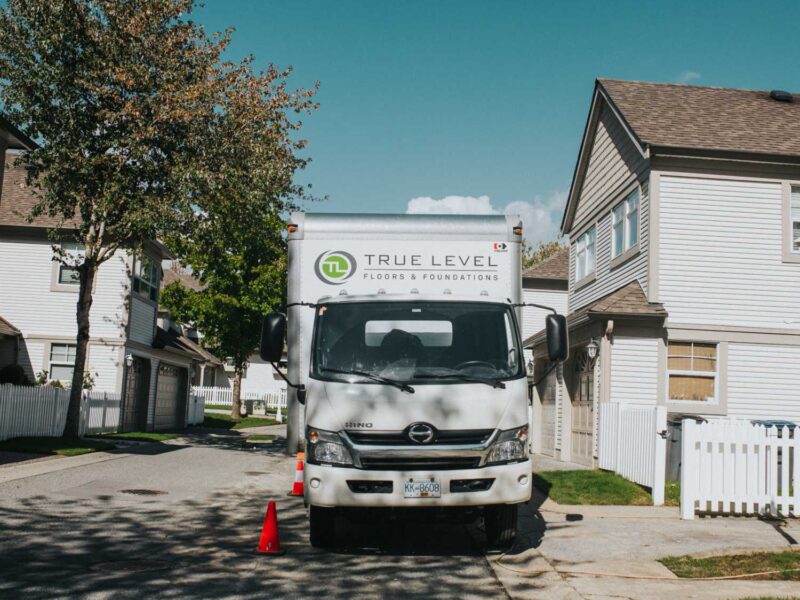 who we help truck in front of strata