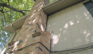 chimney separating from a house